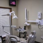 Professional headshot of a dentist