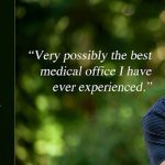 Generic professional photo of a dentist representing Oak Grove Dental Center