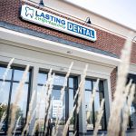 Smiling dentist at Lasting Impressions Family Dental Care