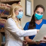 Professional portrait of a dentist representing Aspen Dental East Wenatchee