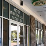Smiling dentist at Community Dental of Hamilton