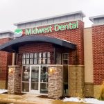 A professional dentist representing Midwest Dental - Eagan