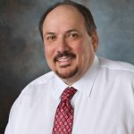 Professional photo of Dr. John K. Hackbarth, DDS