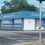 Professional headshot of a dentist at Florida Dental Centers