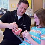 Professional photo of Dr. Rachel West Perentis or Dr. Gregory Joseph Perentis