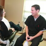 Professional headshot of a dentist from Tzagournis Dental Group